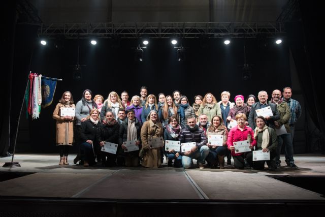 Homenaje al grupo de Coros y Danzas 'La Purísima' en las fiestas patronales