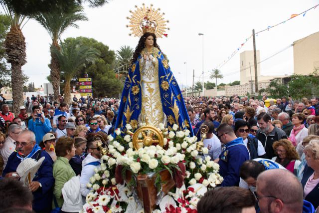 Una multitudinaria romería arropa a la Purísima en su regreso a Bolnuevo